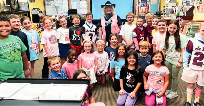 Shown are students and staff from the Dunmore Elementary Center, who participated in “Give Like Dolly Day” on September 25, to support Children’s Literacy in Lackawanna County with the Dolly Parton Imagination Library. Staff and students were encouraged to dress in pink, sparkles, and western-themed attire in honor of Dolly Parton. Students participated in Dolly-themed activities during the school day and the district collected $9, $2, or $5 in honor of her “Working 9 to 5” song to donate to Dolly’s Imagination Library.